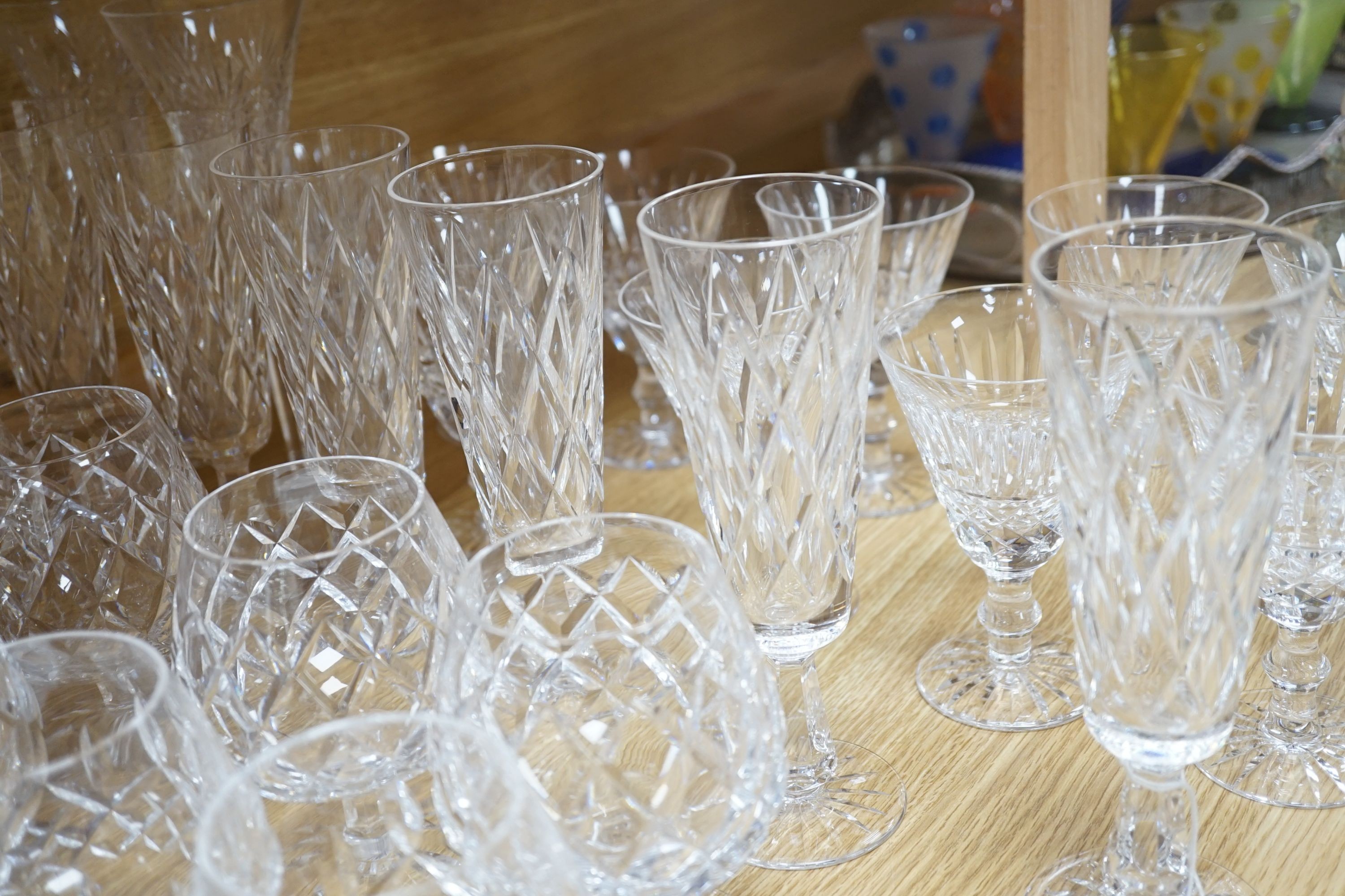 A large comprehensive suite of Waterford Tramore pattern cut crystal drinking glasses